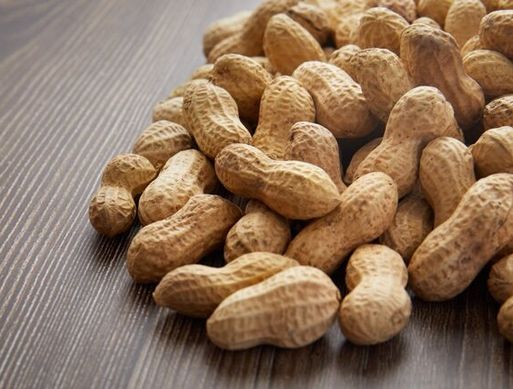 A pile of peanuts in shells