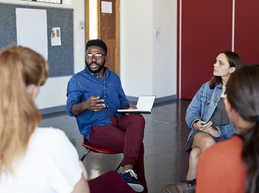 Student speaking in a seminar group - RSPH student member