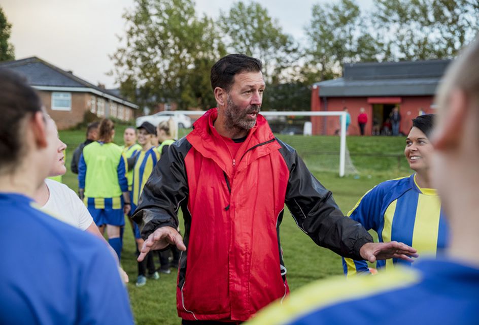 Male local football coach encouraging his team - RSPH accociate member
