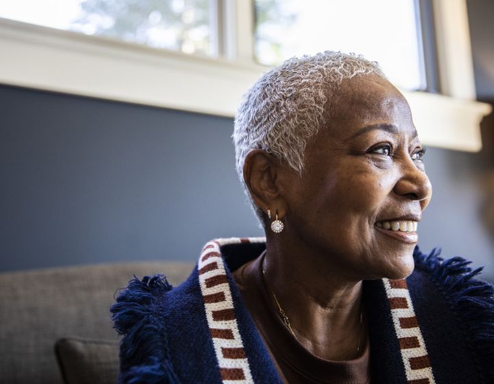 Older woman smiling - RSPH fellow