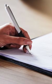 A person signing a document