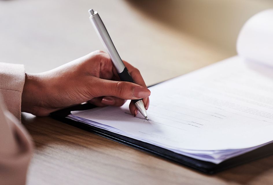 A person signing a document