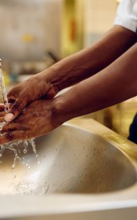A chef washing his hands