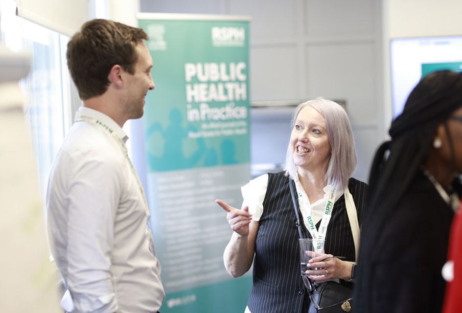RSPH member talking with staff at the 2024 members open day