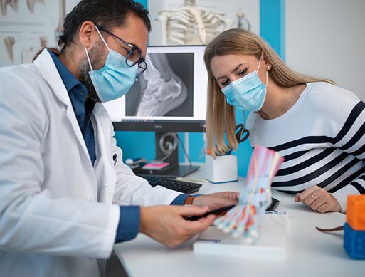 Podiatrist with a patient