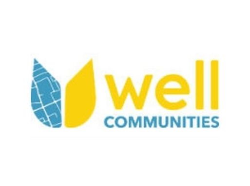 A logo showing a graphic of a tulip. One half of the tulip is blue with white roads running across it. The other half is yellow. Text reads "well communities".